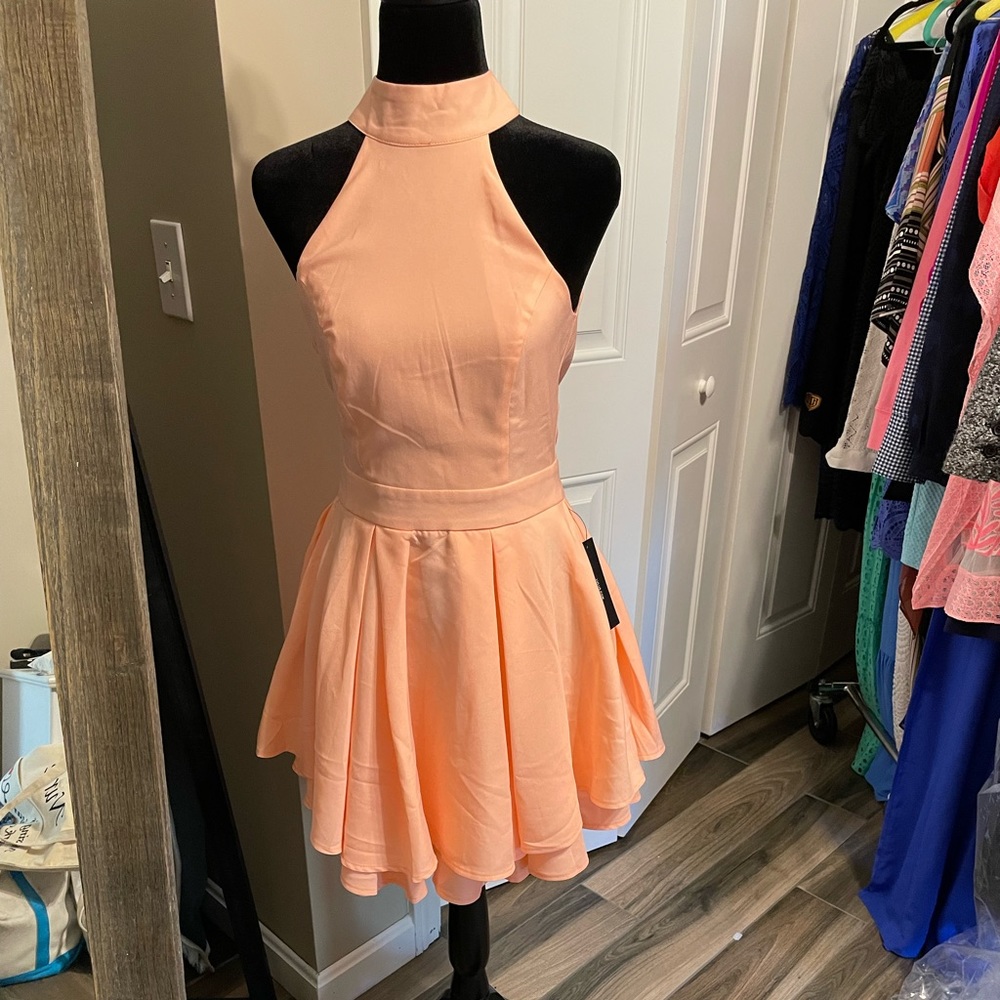 Halter open back peach dress from Lulus size Medium NWT
